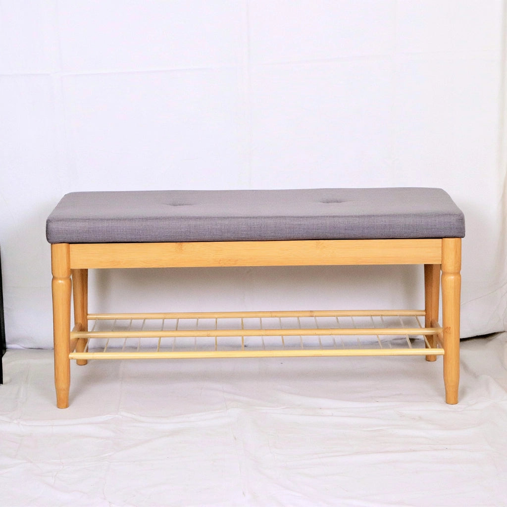 Minimalist bamboo shoe bench with built-in storage in natural brown, ideal for entryways and organizing footwear.