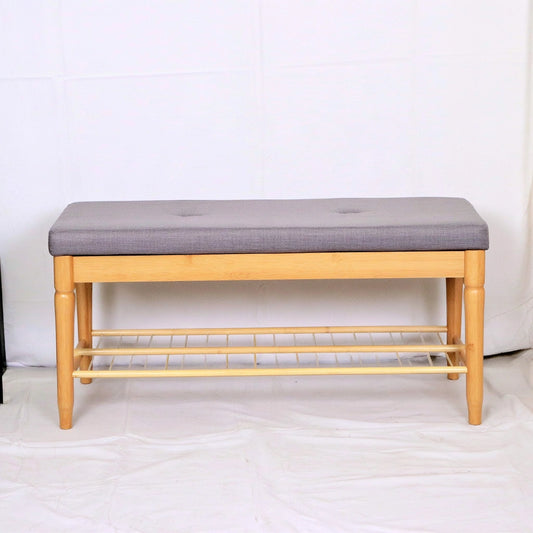 Minimalist bamboo shoe bench with built-in storage in natural brown, ideal for entryways and organizing footwear.